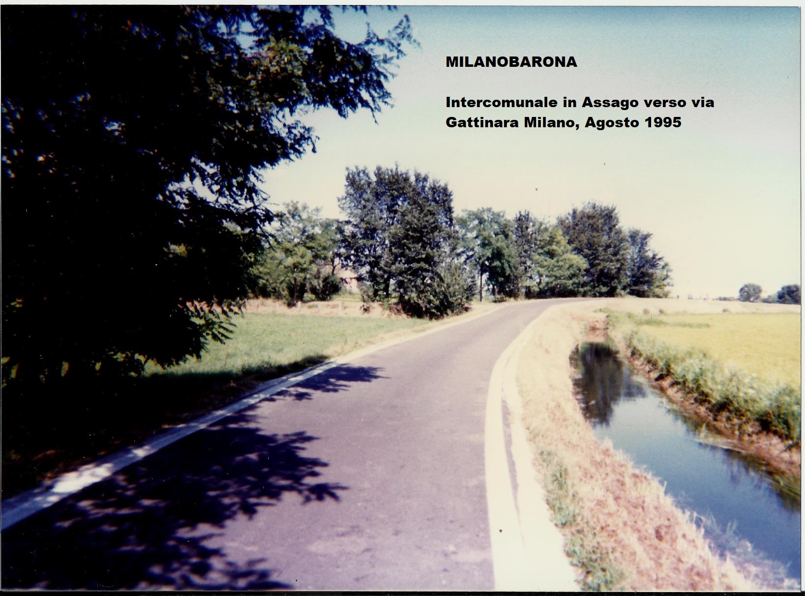 Assago Agosto 1995, verso Milano Barona Via Gattinara, strada Intercomunale, preumibilmente l'attuale Via Cascina Bazzana in Assago. Fonte immagine proprietaria.